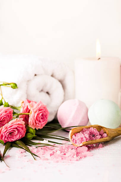 istock Spa setting with pink roses and aroma oil, vintage style 519608814