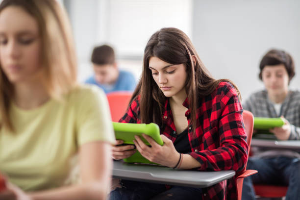 istock Teenage girl using digital tablet on a class at school. 519609582