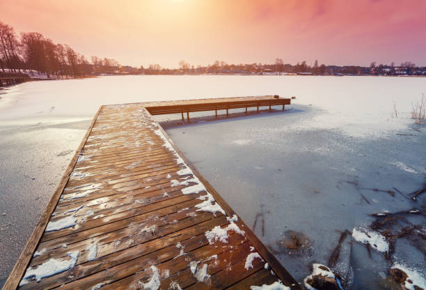 istock Morning on lake with wooden board background 519612158
