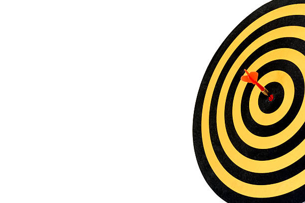 istock dart target with arrow on bullseye with copy space 519613036