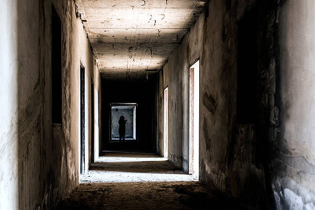 istock Abandoned building ghost living place with scary woman inside 519613656