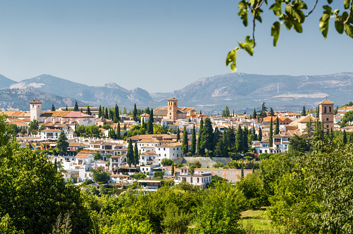 Sunny view of Granada from viewpoint of garden of Generalife, Andalusia province, Spain.