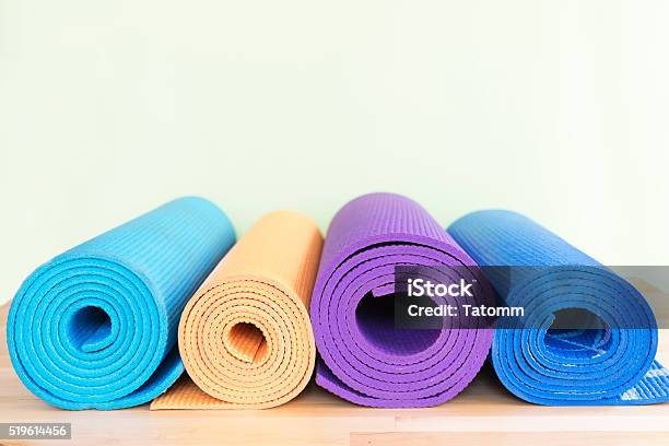 Yoga Mats On The Table Stock Photo - Download Image Now - Exercise Mat, Blue, Colors