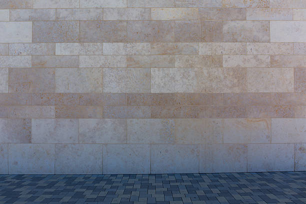 istock Stone wall and pedestrian path in the shade, picture background 519615856
