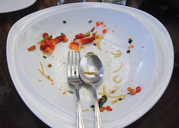 istock Plate with crumbs food ,Remaining Thai food,Selective Focus 519616116
