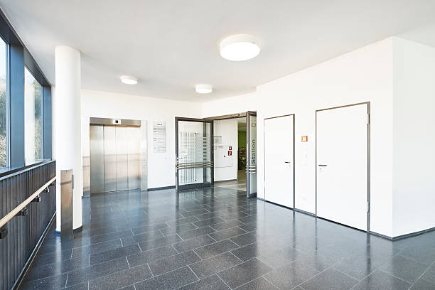 istock Hallway hospital corridor elevator open door 519616274