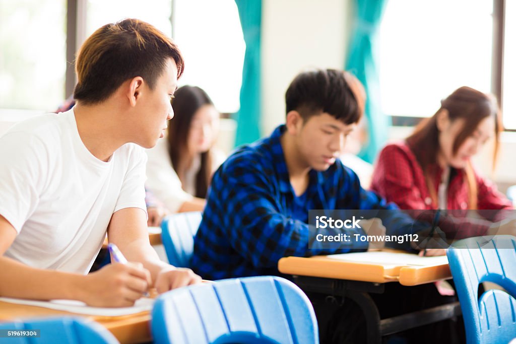 Student Cheater College Student Cheating During Exam In Classroom Stock Photo ...