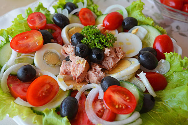 istock Vegetable mixed tuna salad on the white bowl 519619311