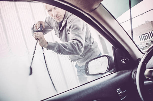 istock Man - car wash with water pressure 519619704