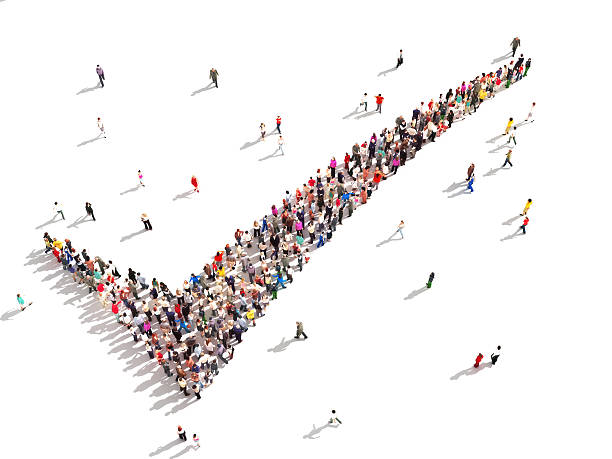 People that agree Large group of people in the shape of a check mark on a white background. pursuit concept stock pictures, royalty-free photos & images