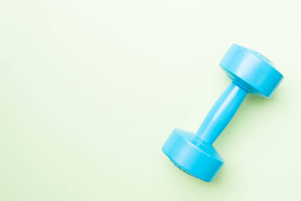 istock dumbbell on the table- vintage style effect picture 519622302