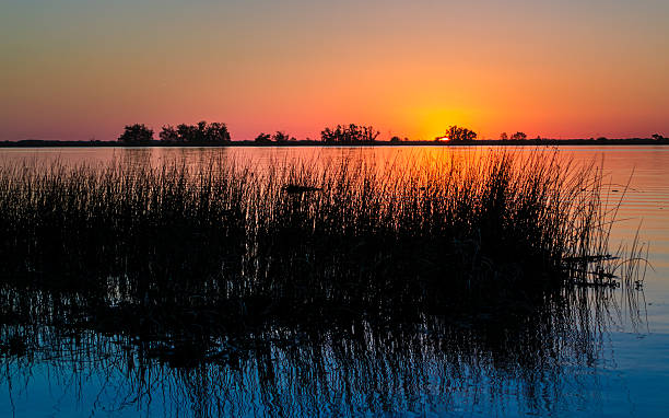 istock Orange and Blue Sunset by the River 519625777