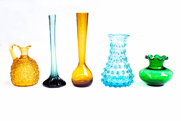 istock Straight row of elegant glass vases 519626543