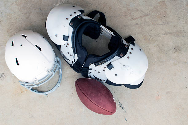 istock Overhead View Football Helmet and Shoulder Pads 519626699
