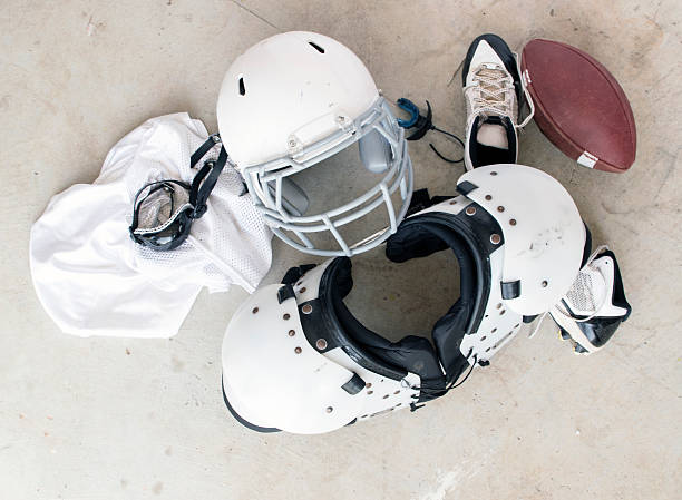 istock Football Safety Gear and Folded Uniform 519626711