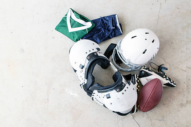 istock Football Safety Gear and Folded Uniform 519626719