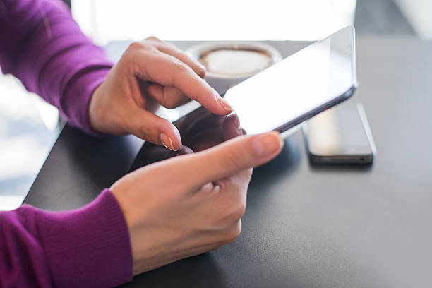 istock Woman With Digital Tablet And Mobile Phone 519642785