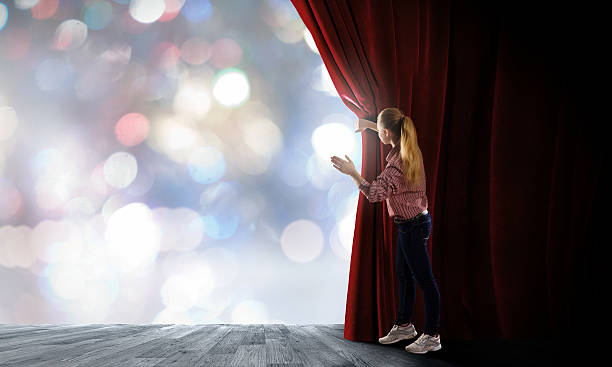 istock Girl opening curtain 519643693