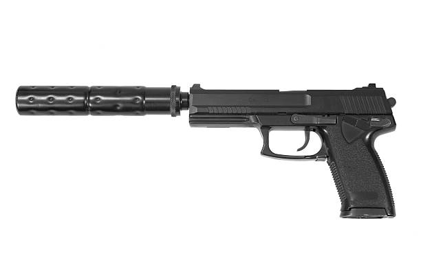 istock special operation handgun with silencer on white background 519643831