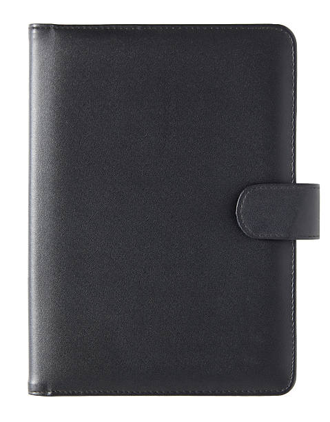 istock black leather cover book isolated on white 519644657