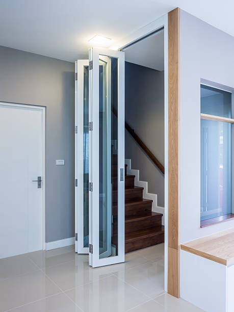 istock Wooden staircase with folding doors 519649217