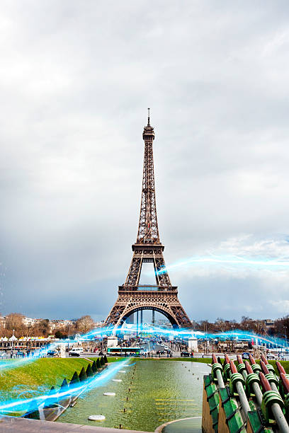 istock Blue streak of lights against Eiffel Tower 519649931