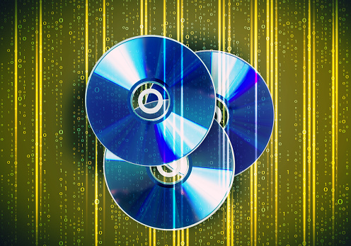 Collection of three cd discs on digital background