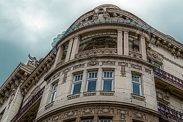 istock Facade on classical building with ornaments and sculptures 519650359