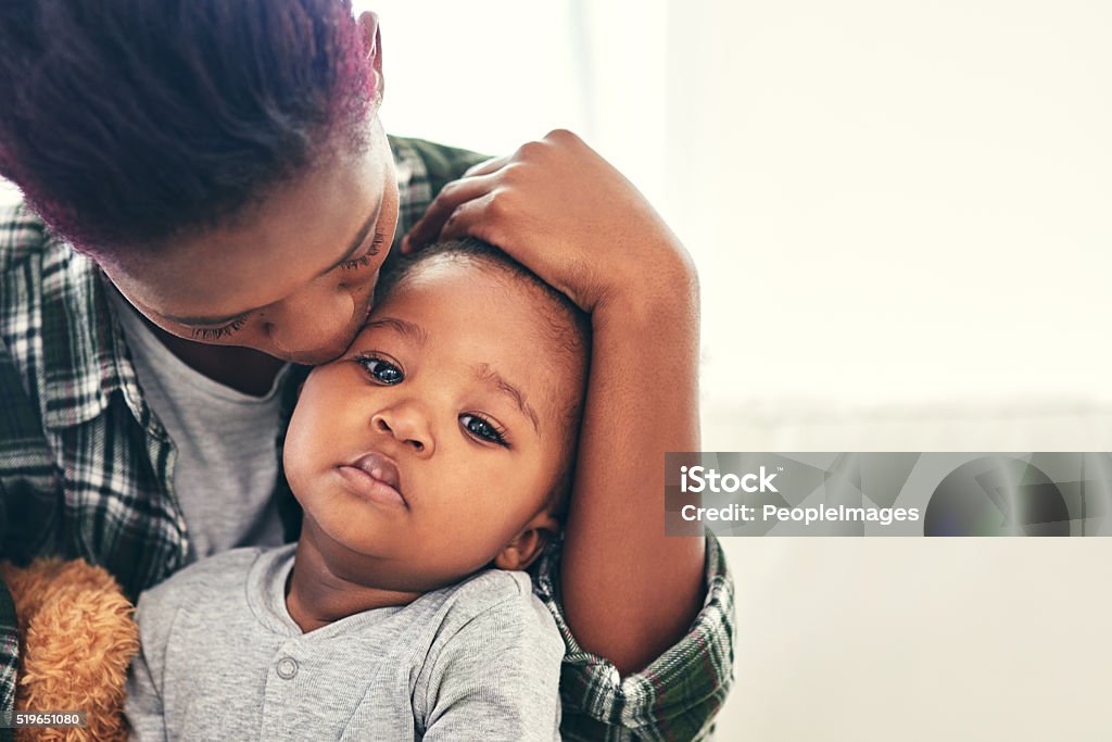 He's growing up so fast Shot of a mother cradling her little baby boy Baby - Human Age Stock Photo