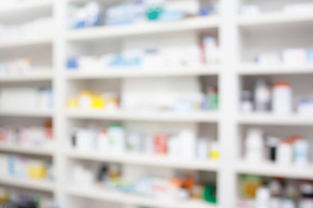 istock blur pharmacy store drugs shelves 519652284