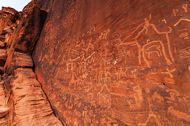 istock Petroglyph figures in stone walls, Wadi Rum. Jordan. 519652840