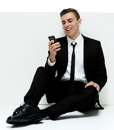 Businessman using mobile phonehttp://www.twodozendesign.info/i/1.png