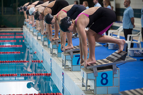 istock Female swimmers at swimming pool 519653754