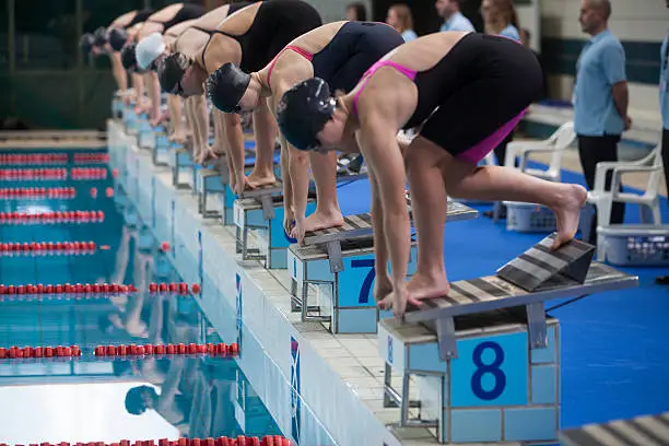 Photo of Female swimmers at swimming pool