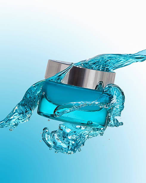 istock The jar of moisturizing gel with blue water splash 519653882