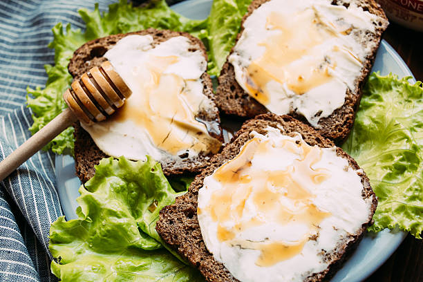 istock Sandwich from rye bread, soft cheese, fresh salad 519654194