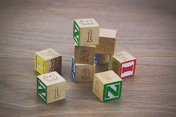 istock Childrens blocks on a wooden floor 519654292