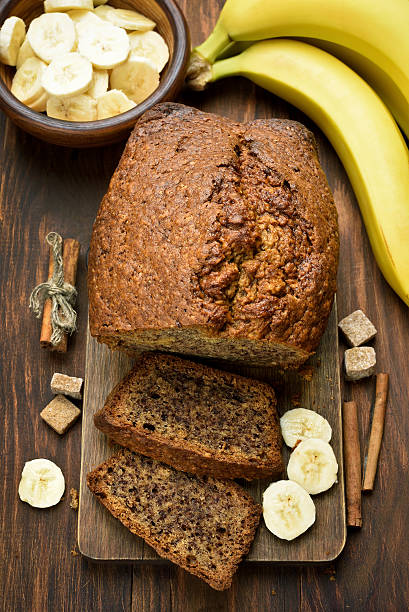 istock Banana bread on wooden table 519655742