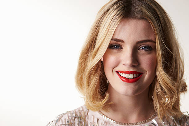 istock Glamorous blonde woman smiling to camera, horizontal 519657226