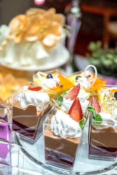 istock gourmet dessert in glass containers close up 519657424