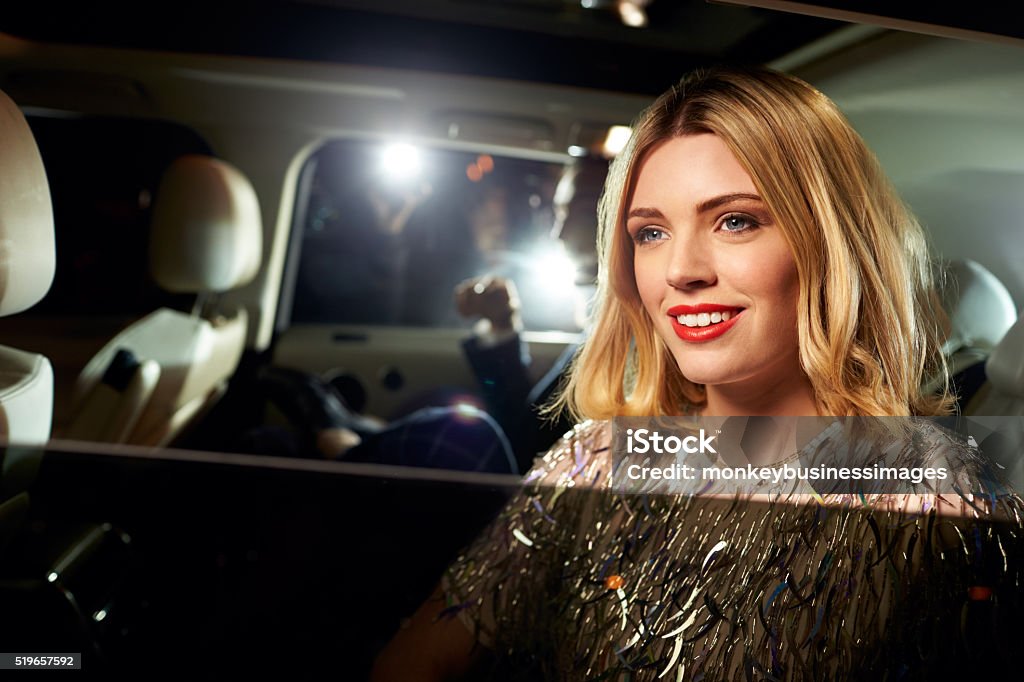 Celebrity couple arriving in limo, photographed by paparazzi Red Carpet Event Stock Photo