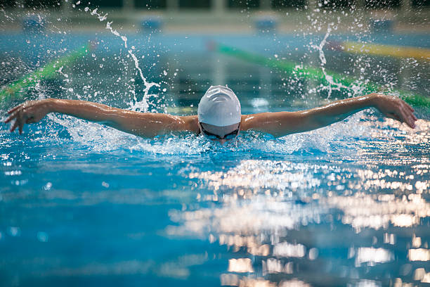 istock Female swimmer in swimming pool 519658242