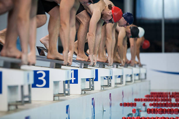 istock Male swimmer on starting block 519658714