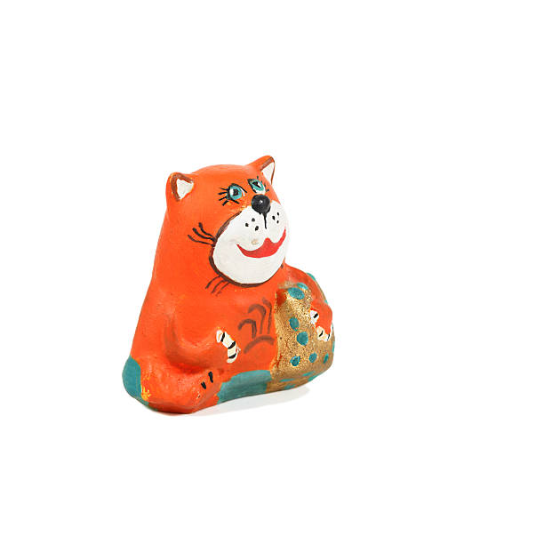 istock closeup handmade pottery funny red kitten with a gift 519660026