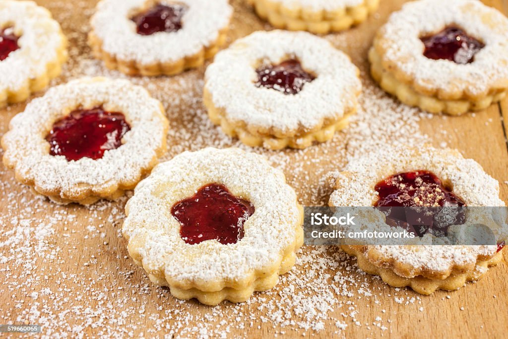 Christmas cookies filled with jam Christmas cookies filled with jam on a floured table Advent Stock Photo