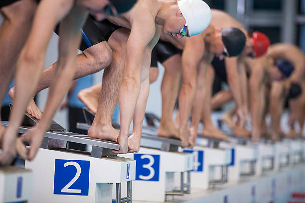 istock Male swimmer on starting block 519660456