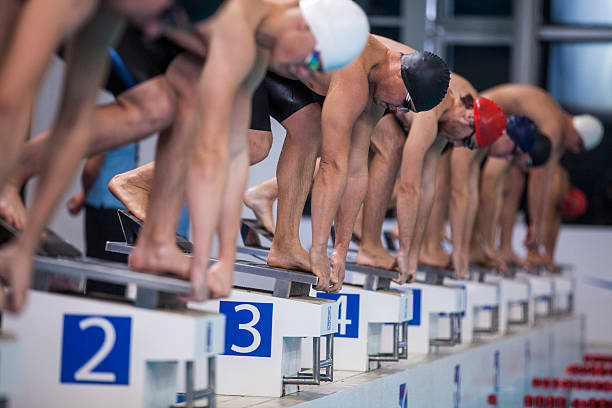 istock Male swimmer on starting block 519660628