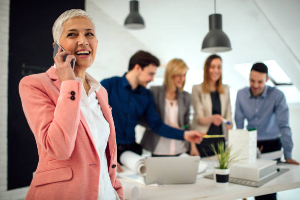 istock Creative Team Examining Blueprint in the office. 519660986