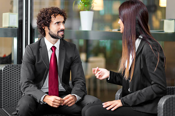 istock Couple of business people talking 519661573