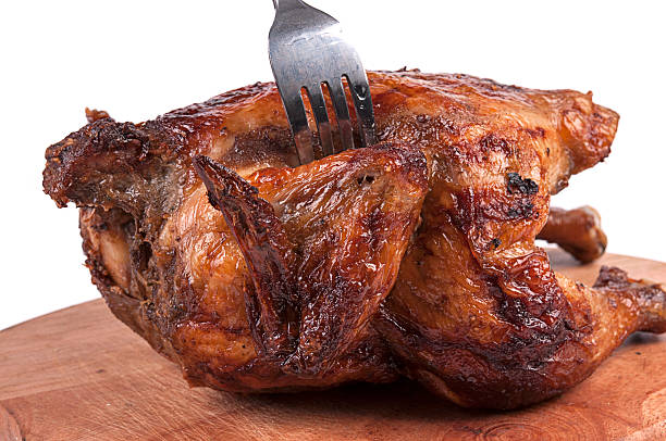 istock Grilled chicken on wooden cutting board 519661732
